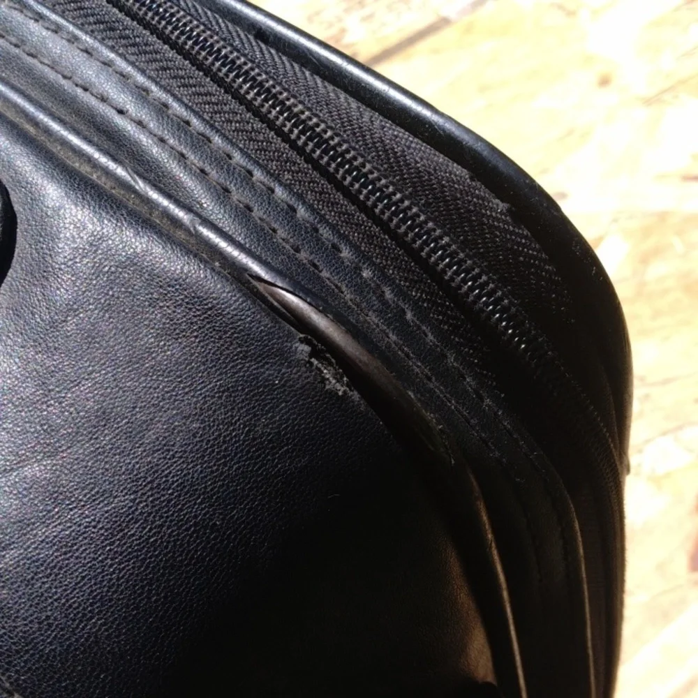 Samsonite Black Leather Briefcase with Flap-Over Closure